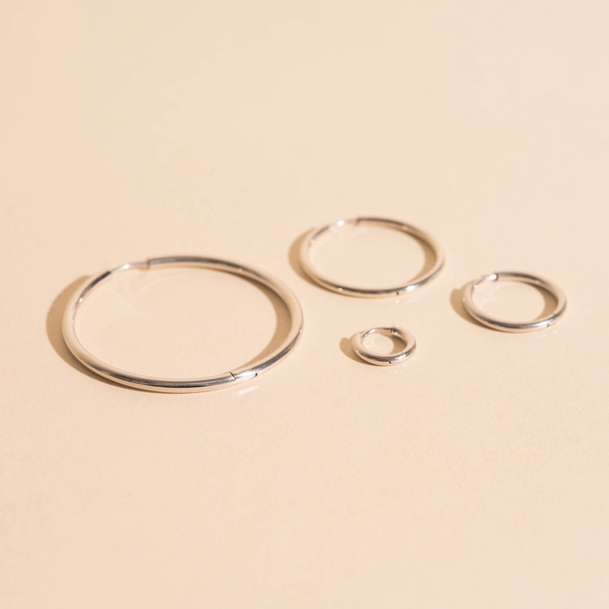 FeatherTUFF™ Circle Hoop Earrings 4-pack