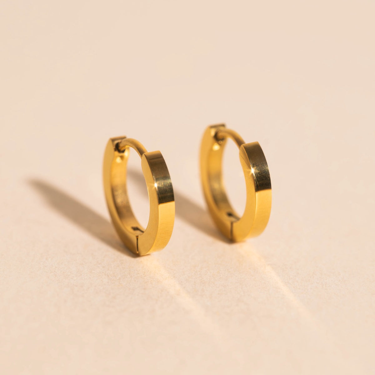 O.G. Smooth Huggie Hoop Earrings
