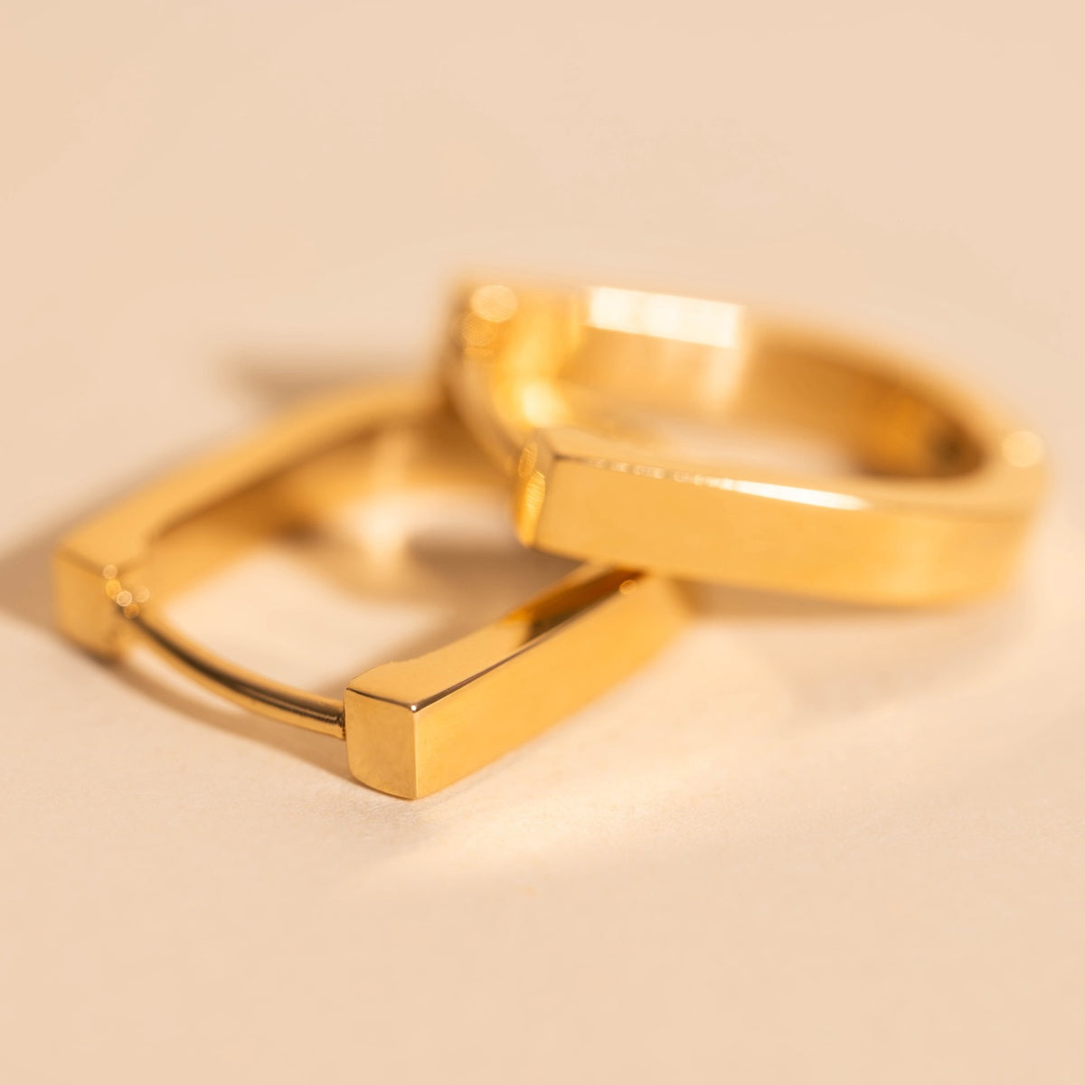 Smooth Stirrup Huggie Hoop Earrings