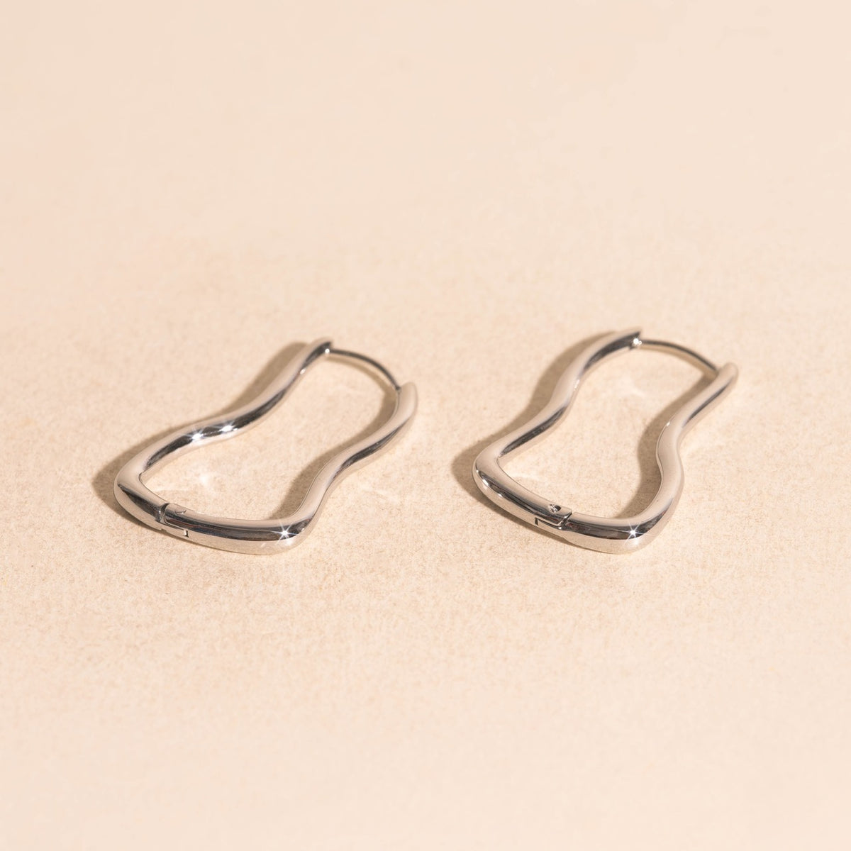 Cosmic Wave Rounded Huggie Hoop Earrings